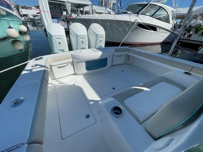 Slide: The Image of 2025 Mag Bay 43 Center Console boat interior with triple outboard engines. - 16