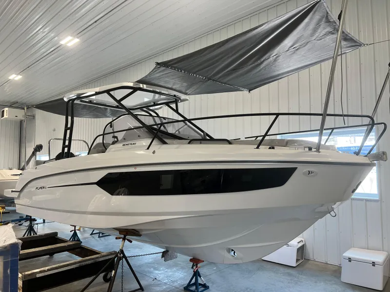 Slide: The Image of 2024 Beneteau Flyer 8 SUNdeck boat in indoor storage. - 1