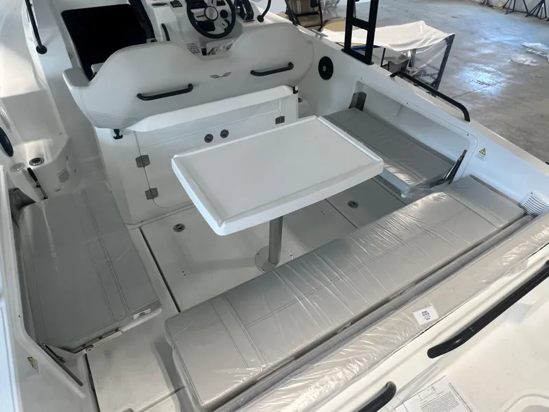 Slide: The Image of 2024 Beneteau Flyer 8 SUNdeck interior with seating and table. - 4
