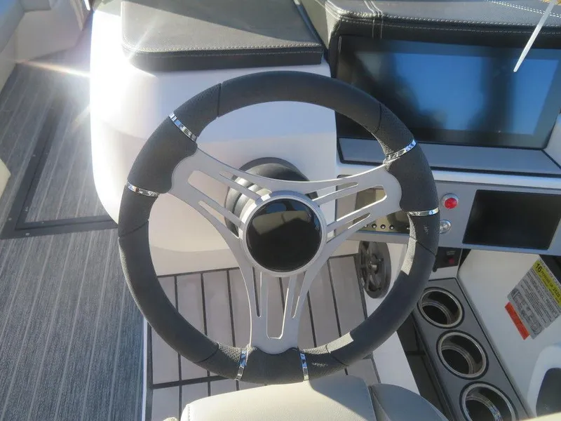 Slide: The Image of Steering wheel and dashboard of 2023 Montara SURF BOSS MT2.0 25 boat. - 11