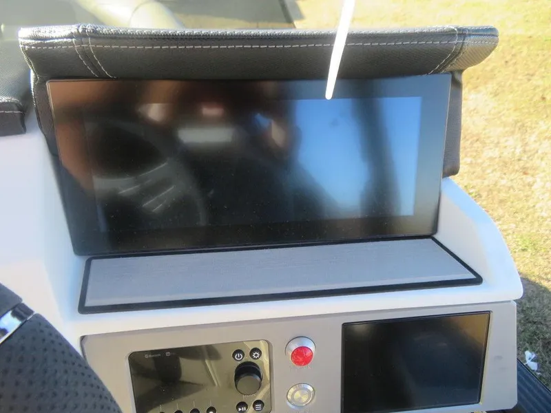 Slide: The Image of 2023 Montara SURF BOSS MT2.0 25 dashboard with touchscreen display and control panel. - 14