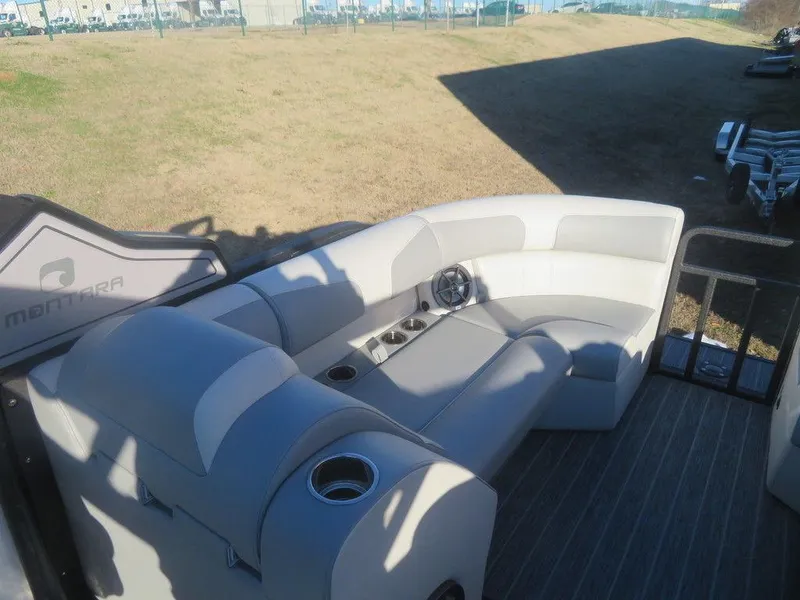 Slide: The Image of 2023 Montara SURF BOSS MT2.0 25 boat interior with plush seating and cup holders. - 17