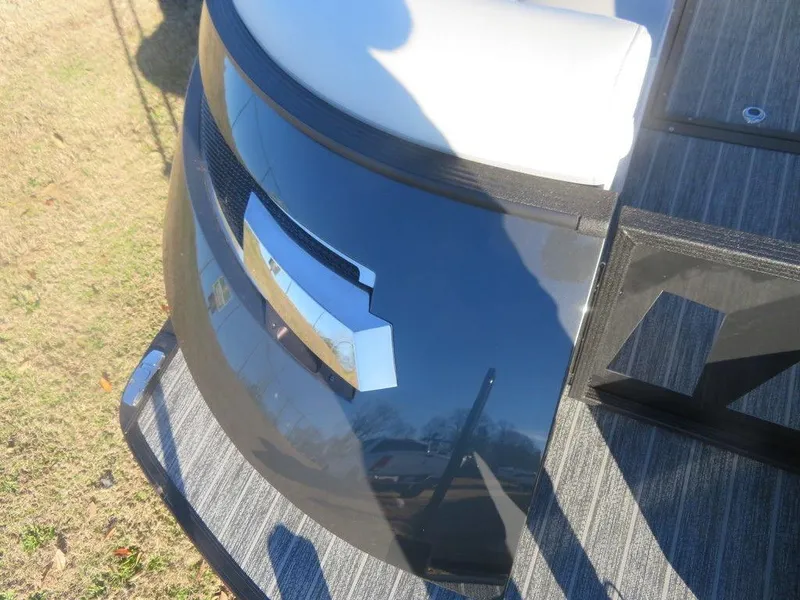 Slide: The Image of 2023 Montara SURF BOSS MT2.0 25 boat, close-up of the sleek black exterior and deck. - 4