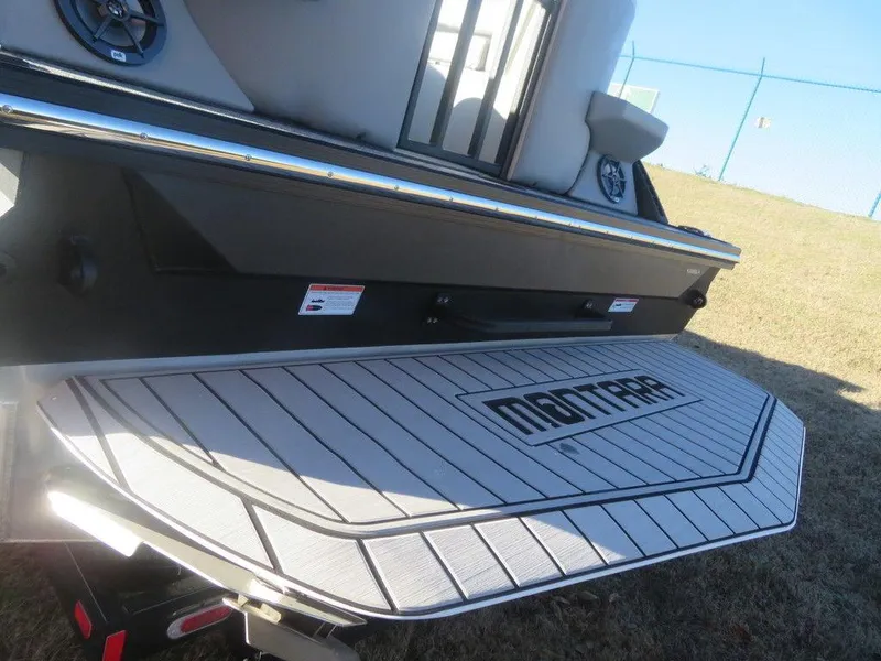 Slide: The Image of 2023 Montara SURF BOSS MT2.0 25 boat rear deck with logo. - 7