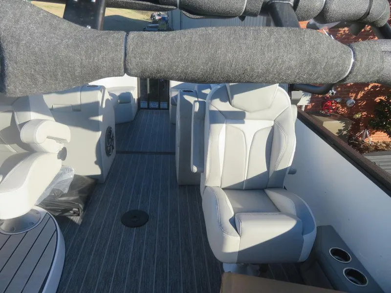 Slide: The Image of 2023 Montara SURF BOSS MT2.0 25 interior with grey seating and flooring. - 8