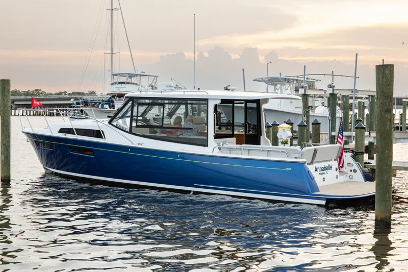 Slide: The Image of 2025 MJM 42 yacht docked at marina during sunset. - 25