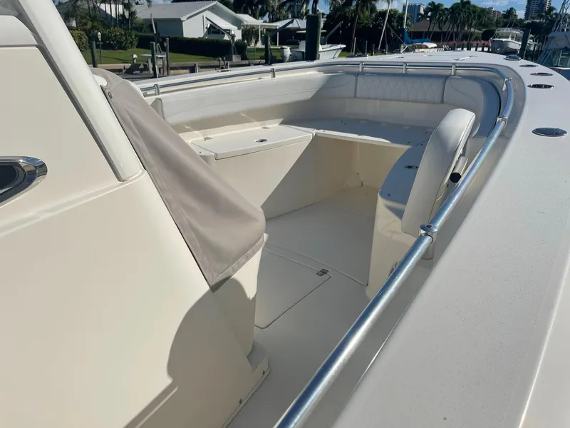 Slide: The Image of Cobia 301 Center Console 2020, spacious deck with seating area. - 4
