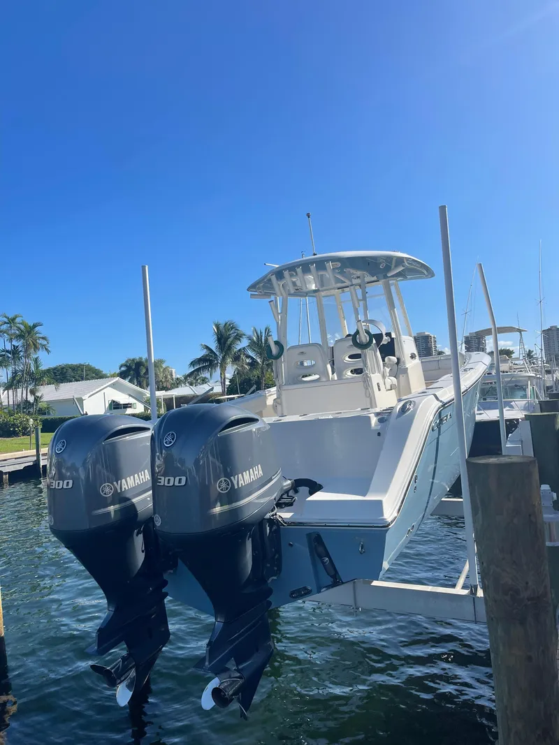 Slide: The Image of Cobia 301 Center Console 2020 with Yamaha engines at dock. - 9