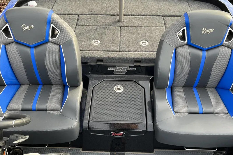 Slide: The Image of 2023 Ranger Z520R boat seats with blue and gray upholstery. - 13