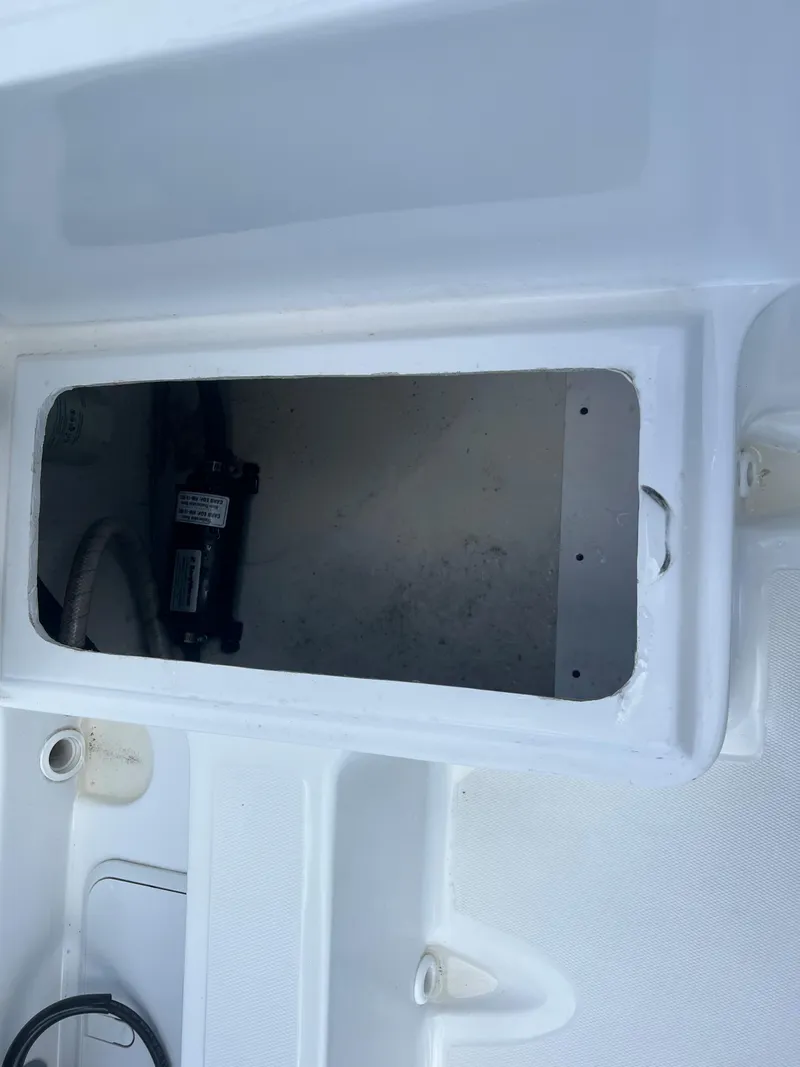 Slide: The Image of Clearwater 2000 boat compartment, 2022 model, open storage area. - 11