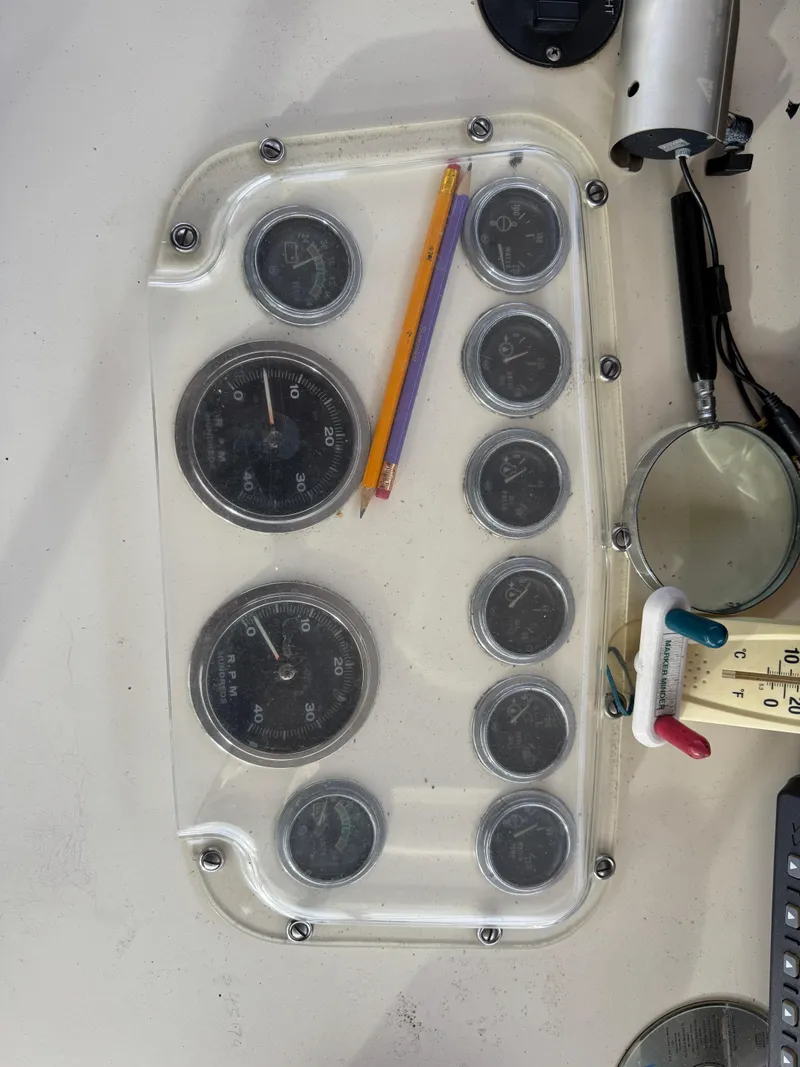 Slide: The Image of Dashboard gauges of a 1978 Hatteras 58 MY yacht. - 15