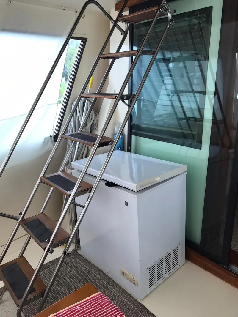 Slide: The Image of Staircase and freezer on 1978 Hatteras 58 MY yacht. - 21