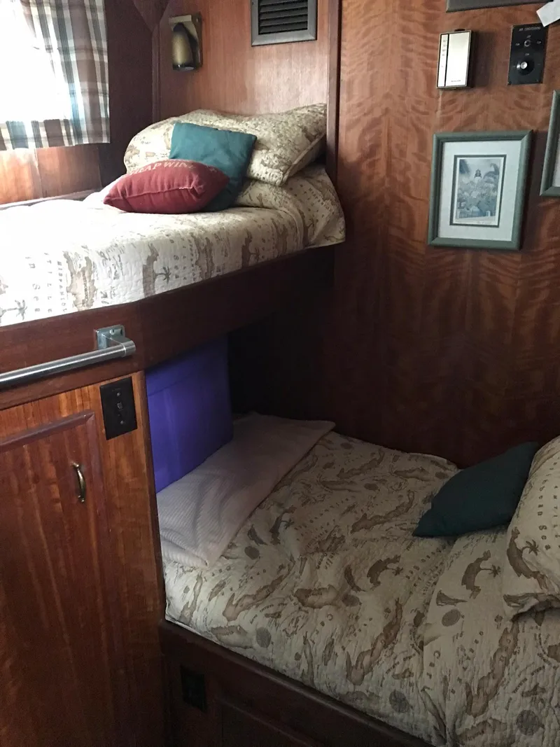 Slide: The Image of Interior cabin of a 1978 Hatteras 58 MY yacht with bunk beds. - 52