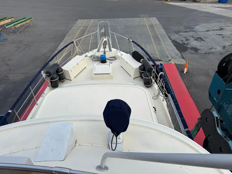 Slide: The Image of 1978 Hatteras 58 MY yacht on dry dock, view from bow. - 8