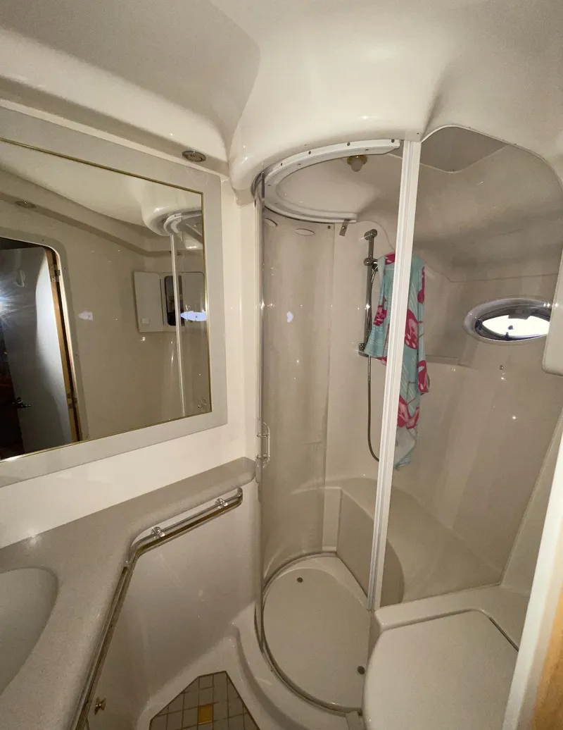 Slide: The Image of Bathroom interior of a 2000 Sea Ray 540 Sundancer yacht with shower and mirror. - 17