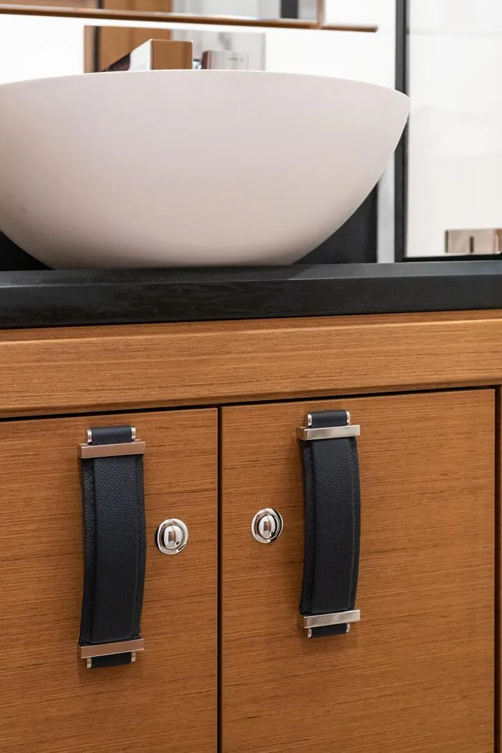 Slide: The Image of Modern bathroom sink and wooden cabinet in Jeanneau 65 yacht, 2023 model. - 6