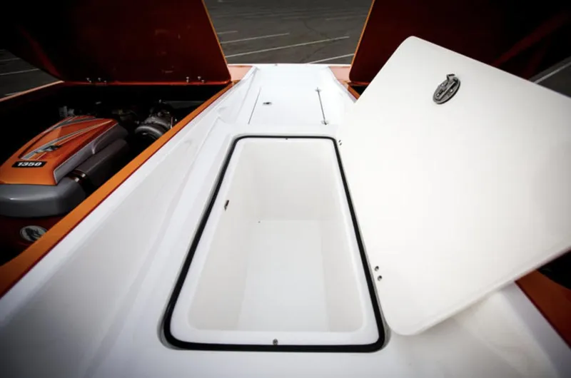 Slide: The Image of 2017 Nordic 43' Enforcer boat with open storage compartment and visible engine. - 25