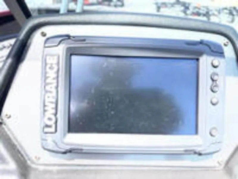 Slide: The Image of Lowrance fish finder on 2022 Alumacraft Competitor 205 Sport boat. - 10