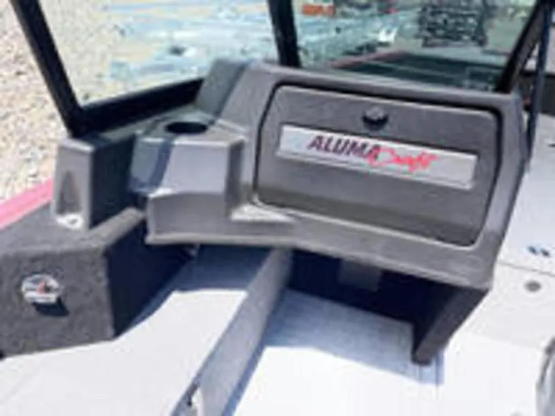 Slide: The Image of 2022 Alumacraft Competitor 205 Sport boat interior dashboard. - 6