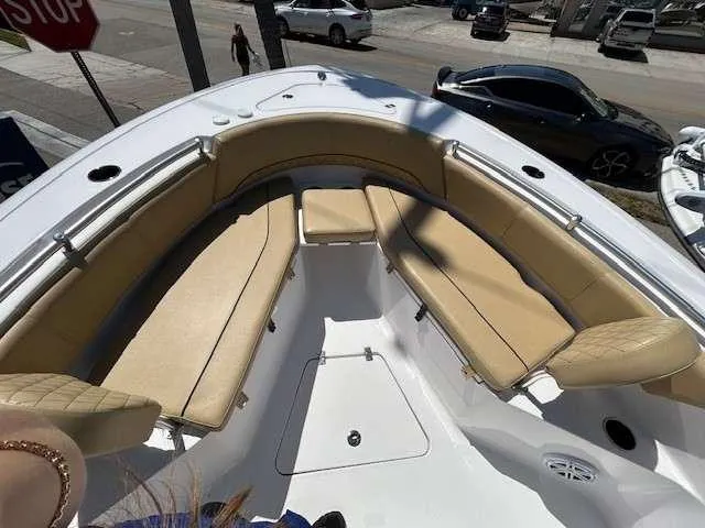 Slide: The Image of 2023 Sportsman 232 Open boat with tan seating and spacious deck area. - 10