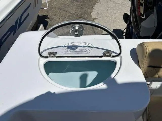 Slide: The Image of 2023 Sportsman 232 Open boat with a sleek, modern console design. - 5