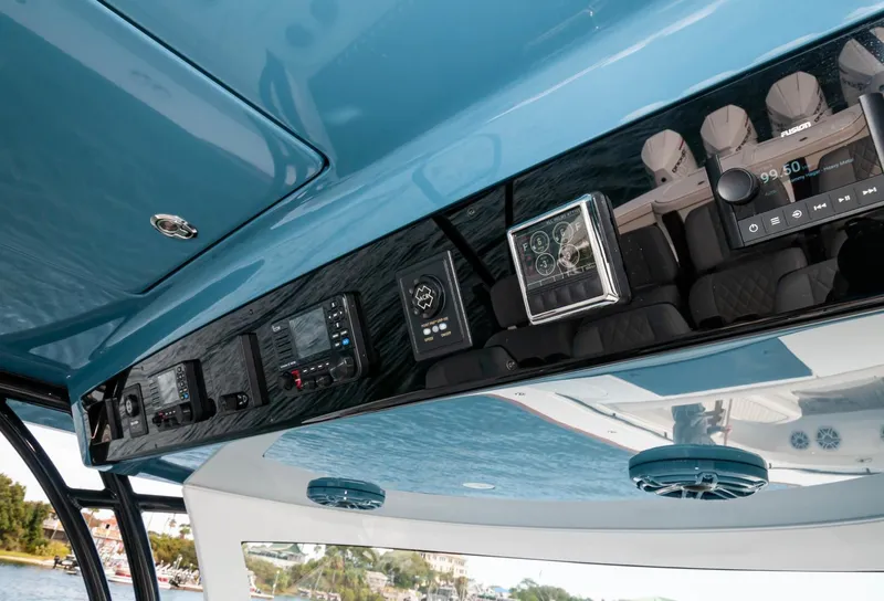 Slide: The Image of 2022 Valhalla Boatworks V46 Center Console dashboard with advanced navigation and control systems. - 18