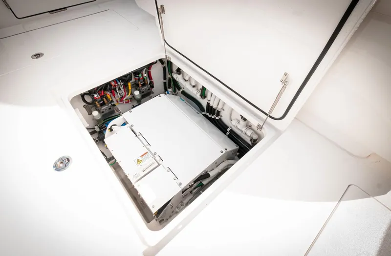 Slide: The Image of 2022 Valhalla Boatworks V46 Center Console electrical compartment. - 23