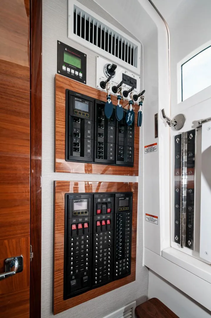 Slide: The Image of Electrical control panel on 2022 Valhalla Boatworks V46 Center Console. - 4