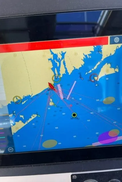 Slide: The Image of Navigation system display on a 2006 Sabre 38 Hard Top Express boat. - 13