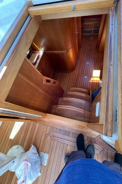 Slide: The Image of 2006 Sabre 38 Hard Top Express interior wooden staircase and cabin. - 17