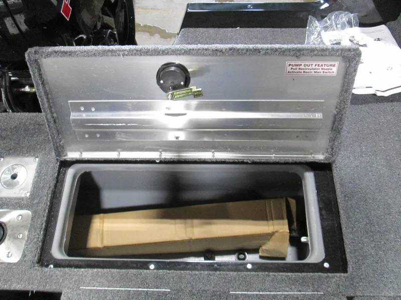 Slide: The Image of 2023 Tracker Pro Guide V-175 WT storage compartment with pump-out feature. - 12