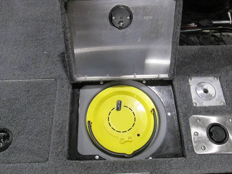 Slide: The Image of 2023 Tracker Pro Guide V-175 WT boat storage compartment with yellow lid. - 13