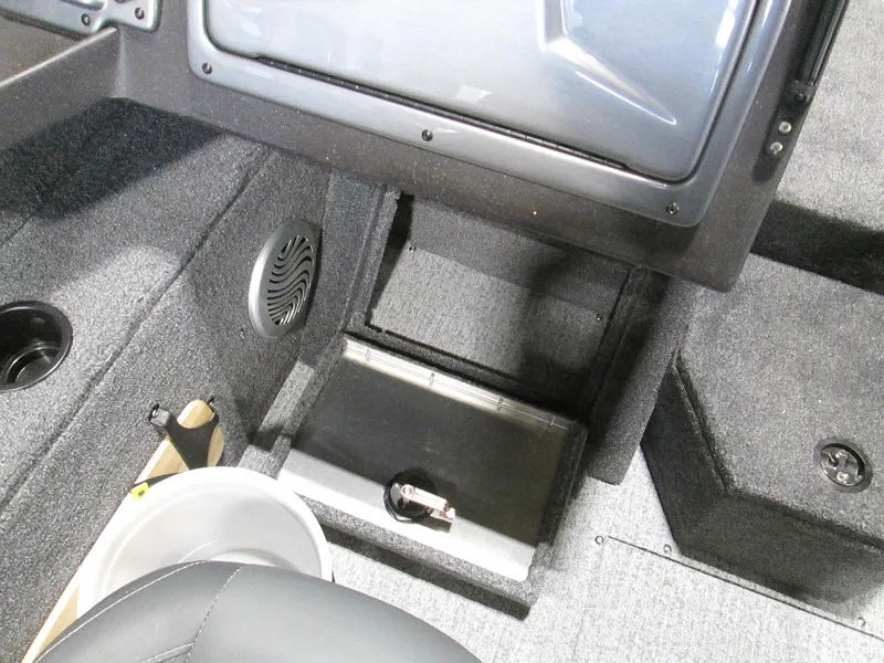 Slide: The Image of 2023 Tracker Pro Guide V-175 WT boat interior with storage compartments and speaker. - 16