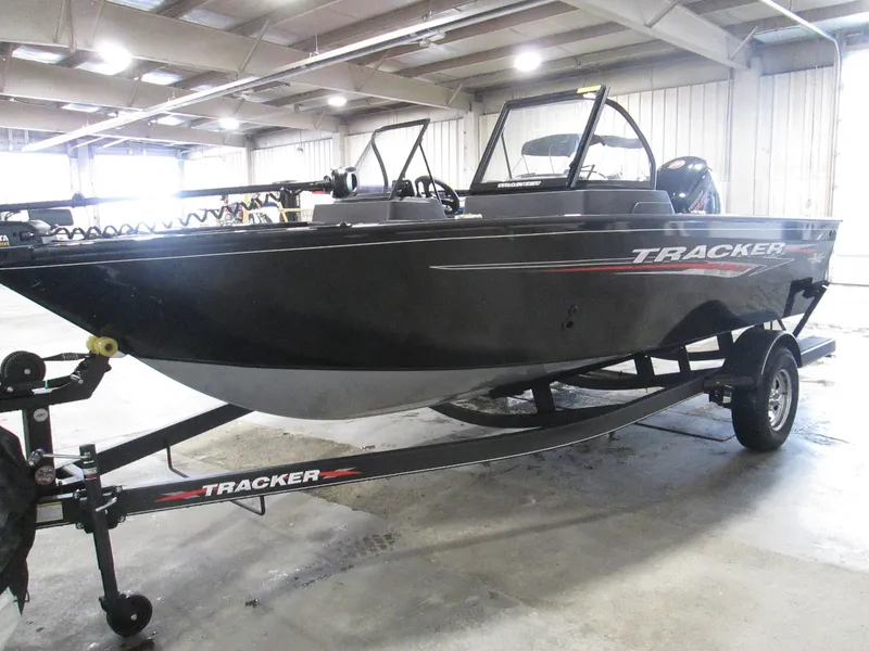 Slide: The Image of 2023 Tracker Pro Guide V-175 WT boat on trailer in indoor storage. - 4