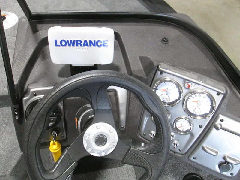 Slide: The Image of 2023 Tracker Pro Guide V-175 WT dashboard with Lowrance fishfinder and gauges. - 5