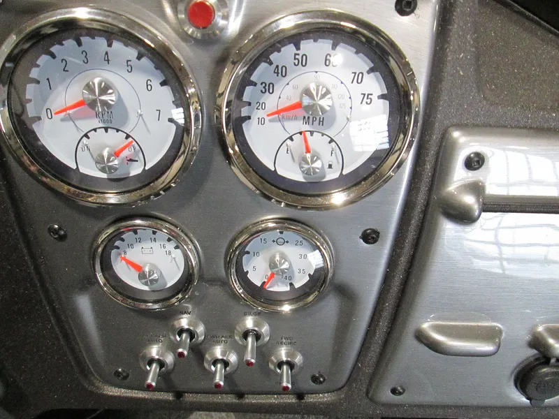 Slide: The Image of 2023 Tracker Pro Guide V-175 WT dashboard with speedometer and gauges. - 6