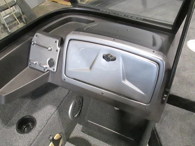 Slide: The Image of 2023 Tracker Pro Guide V-175 WT boat dashboard and storage compartment. - 7