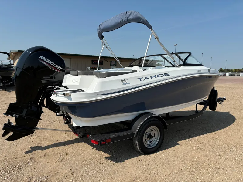 Slide: The Image of 2023 Tahoe 185 S boat with Mercury outboard motor on trailer. - 5
