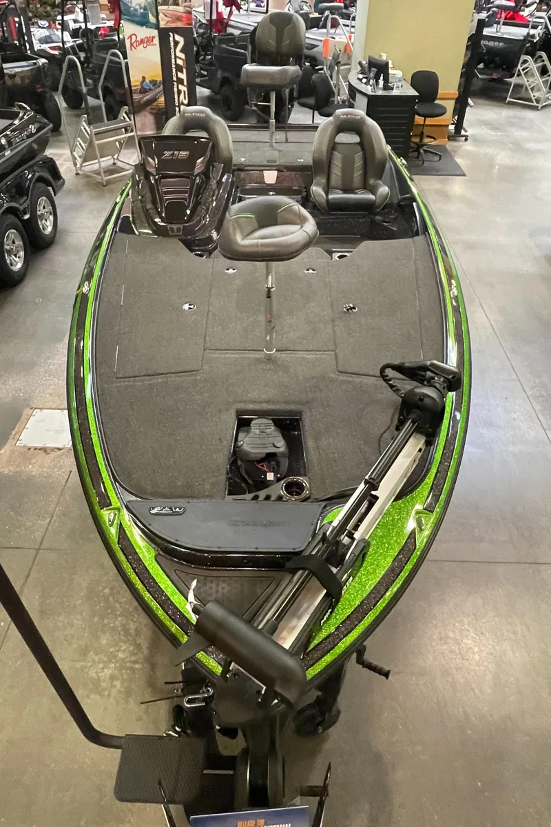 Slide: The Image of 2023 Nitro Z19 bass boat on display in showroom. - 3