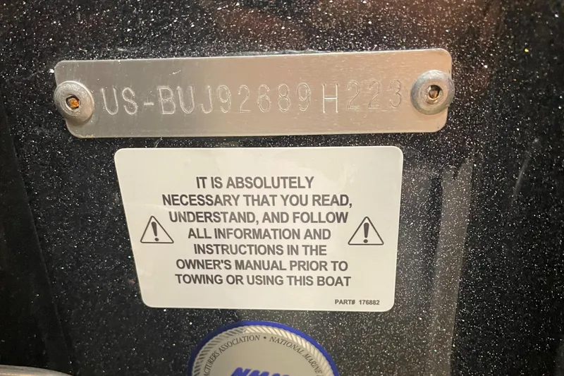 Slide: The Image of 2023 Nitro Z19 boat warning label and hull identification number (HIN) plate. - 6