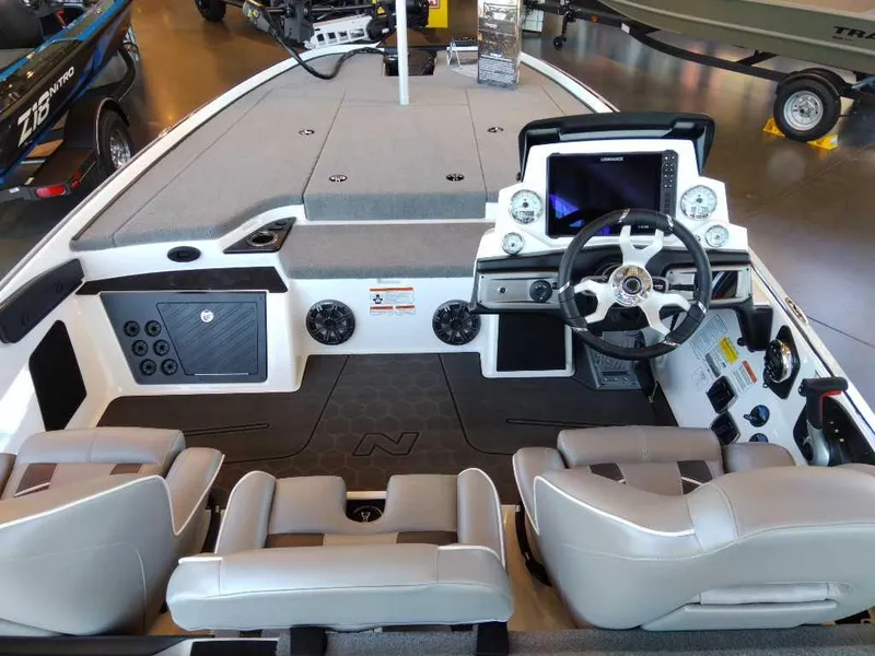 Slide: The Image of 2023 Nitro Z20 boat interior with modern dashboard and seating. - 10
