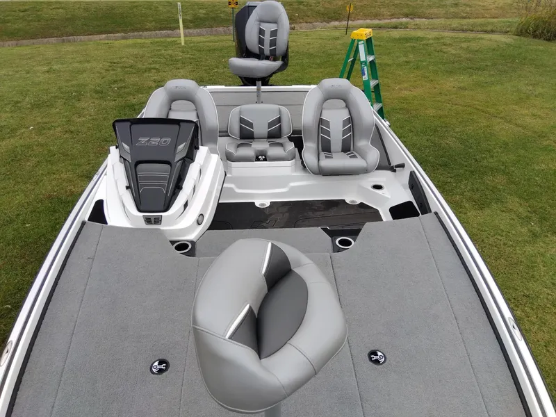 Slide: The Image of 2023 Nitro Z20 fishing boat with gray seating and spacious deck. - 4