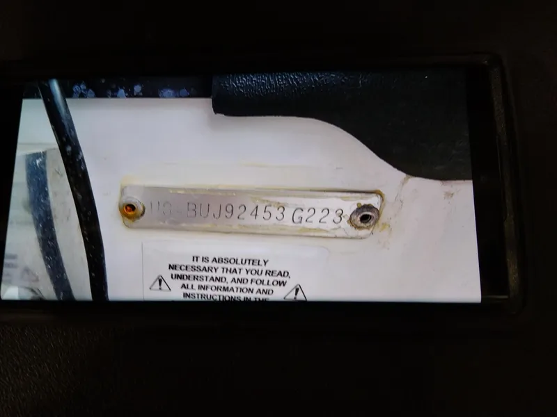 Slide: The Image of Nitro Z20 2023 model serial number plate with safety instructions. - 7