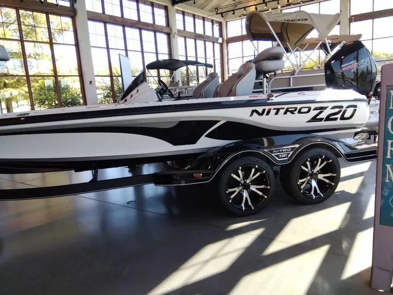 Slide: The Image of 2023 Nitro Z20 boat on display in a showroom. - 9