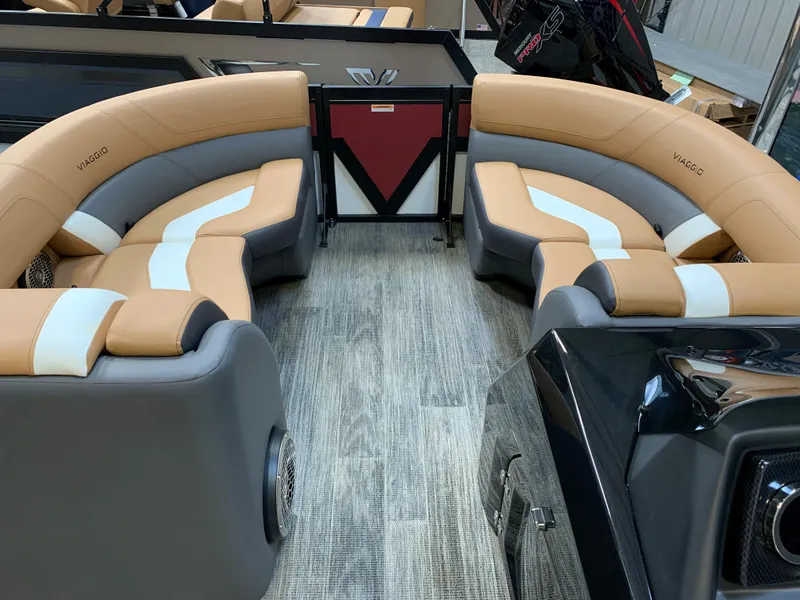 Slide: The Image of 2023 Viaggio Diamante 23 U boat interior with tan and gray seating. - 13