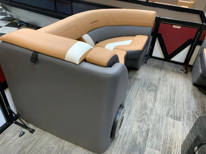 Slide: The Image of 2023 Viaggio Diamante 23 U boat interior with tan and gray seating. - 14