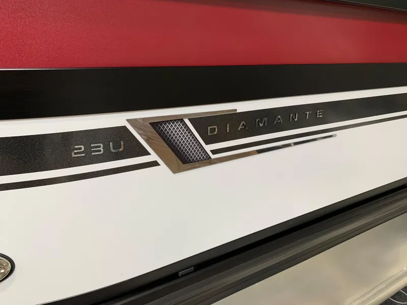 Slide: The Image of 2023 Viaggio Diamante 23 U boat model close-up with logo and design details. - 3