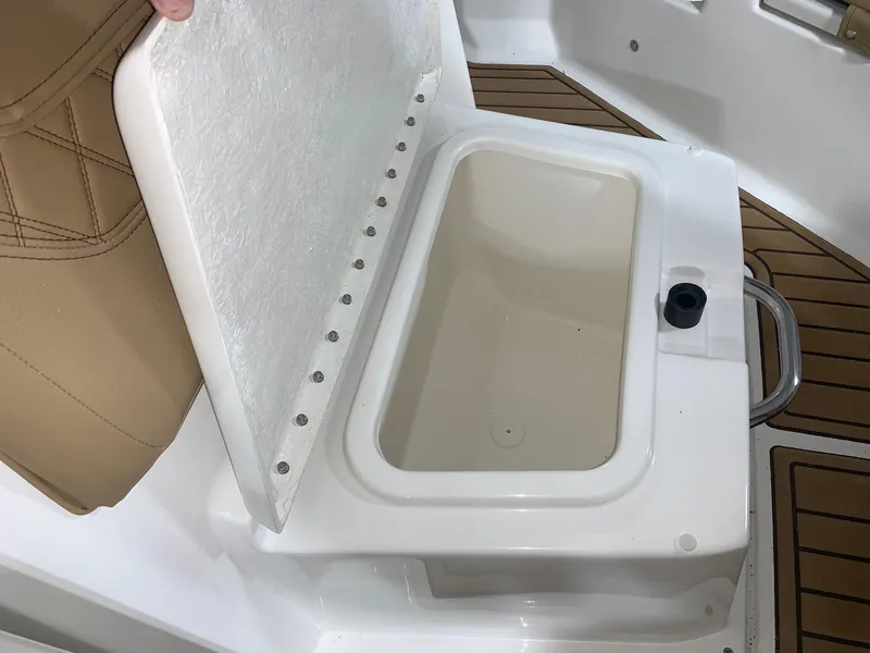 Slide: The Image of Open storage compartment on 2024 Bayliner Trophy 20 CC boat. - 14