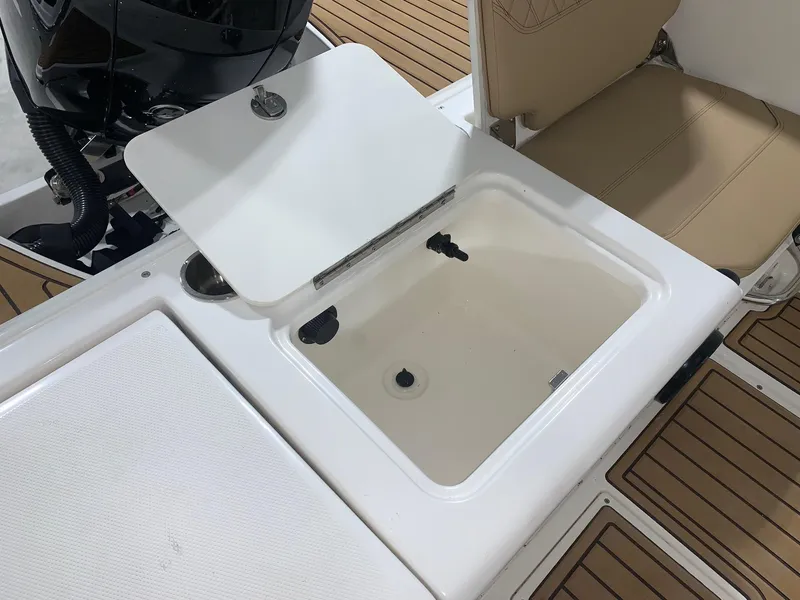 Slide: The Image of Open storage compartment on 2024 Bayliner Trophy 20 CC boat. - 8