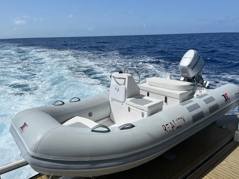 Slide: The Image of Inflatable boat on the ocean, Fantasy Houseboat 2009 model. - 27
